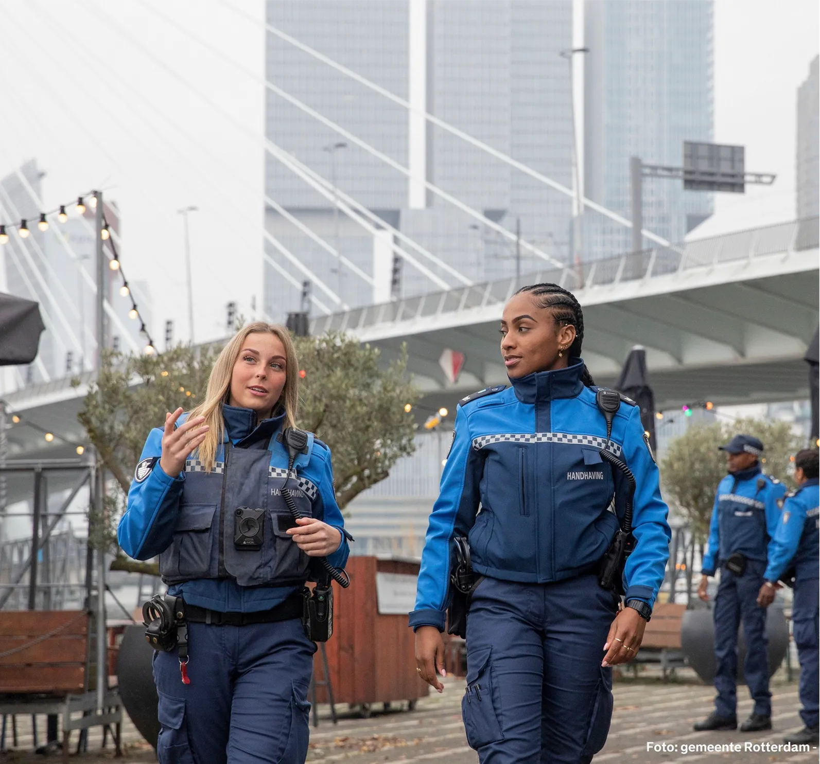 Enforcement officers of gemeente Rotterdam in workwear
